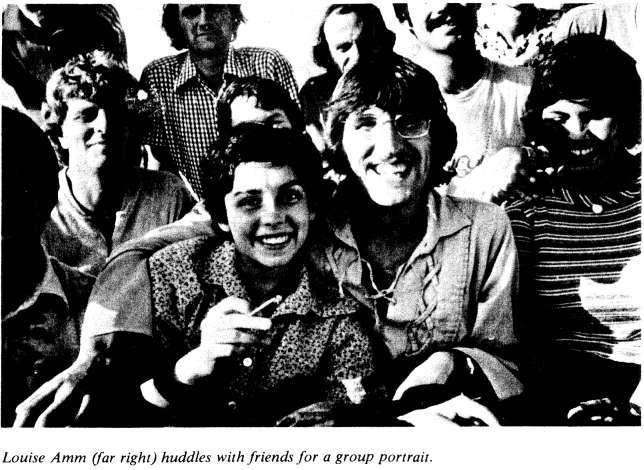 Louise Amm (far right) huddles with friends for a group portrait