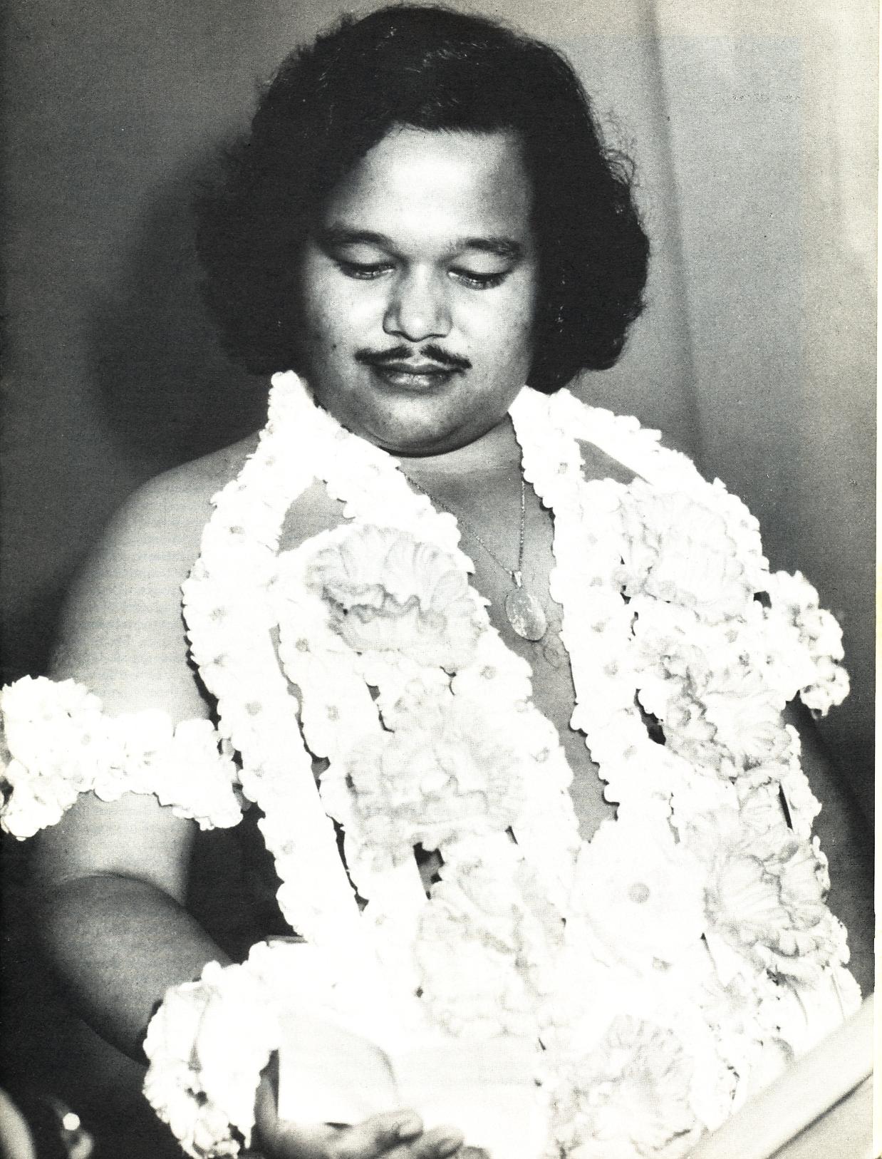 Prem Rawat Inspirational Speaker Admiring His Gorgeous Mala While Dressed As Krishna 1979 Prem Rawat Inspirational Speaker Admiring His Gorgeous Mala