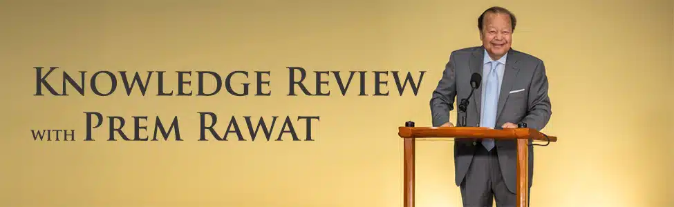 Prem Rawat standing at a podium