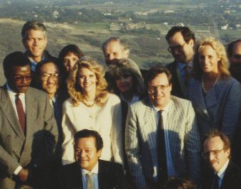 Mike Finch in stripes beween Prem Rawat's mistress and Prem Rawat Foundation President, Linda Pascotto